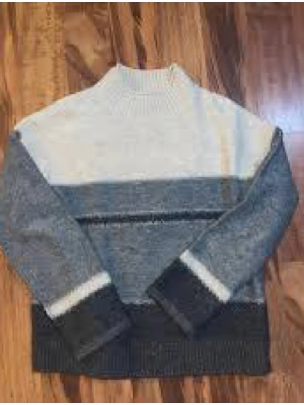 Universal tread mock neck sweater
